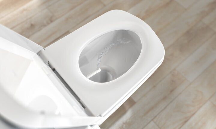 Ein Dusch-WC von oben fotografiert.